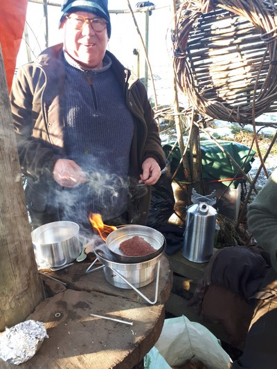 James cooking breakfast for the workers.